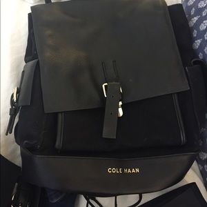 Cole Haan leather and canvas buckle backpack